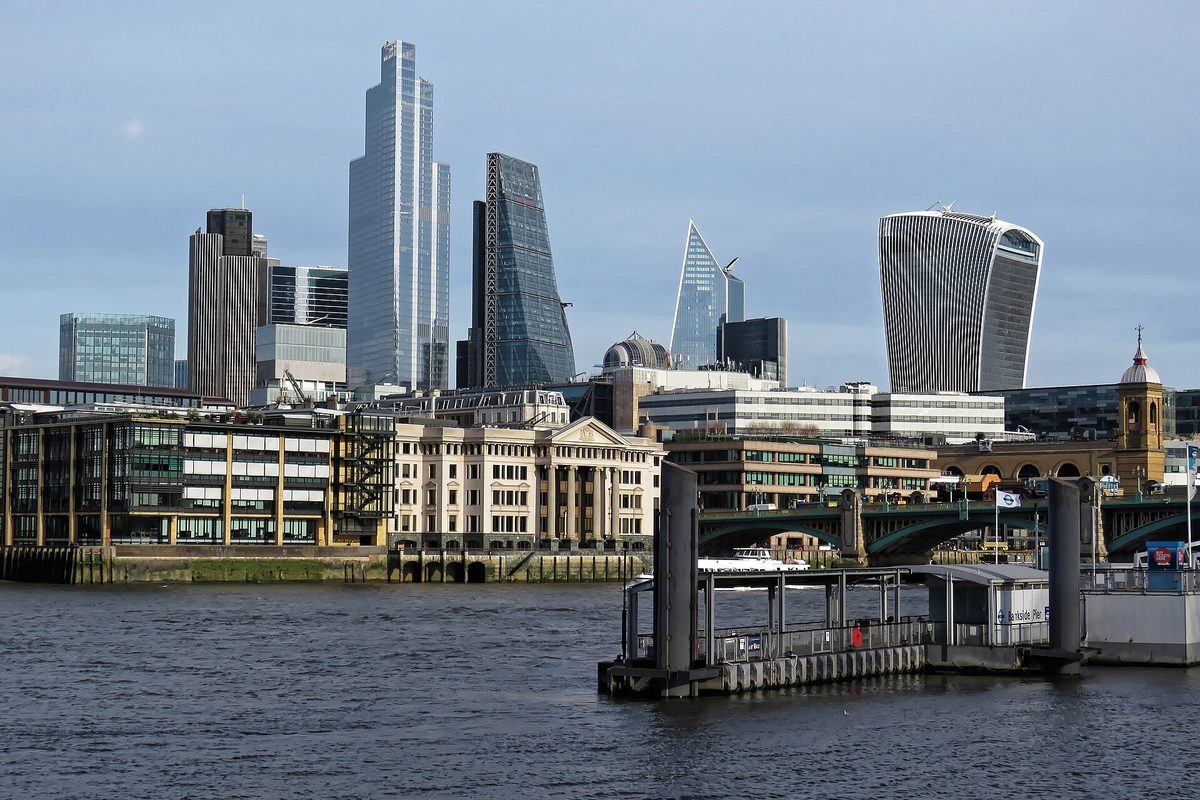 The City of London skyline seen from Bankside in Southwark across the River Thames, with the curved Walkie Talkie tower, 22 Bishopsgate, Southwark Bridge and Bankside Pier